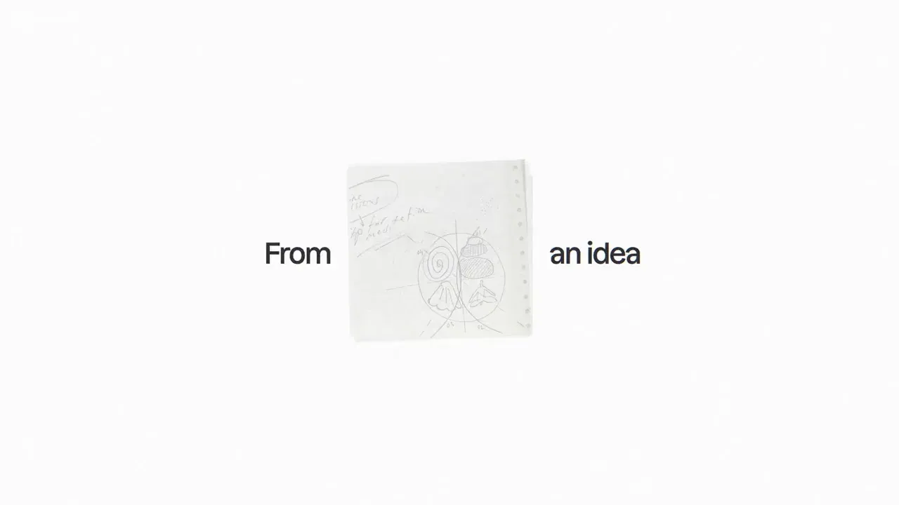 From an idea typed on a white ground, a small paper page between the words.